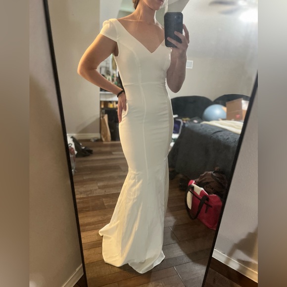 Lulu’s Love Will Follow White Cap Sleeve Mermaid
Maxi Dress - Picture 2 of 6